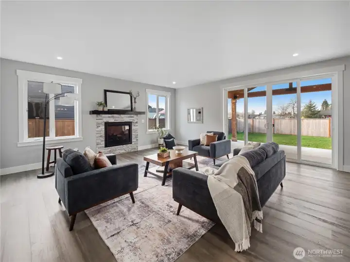 Sliding glass doors lead to large covered patio.