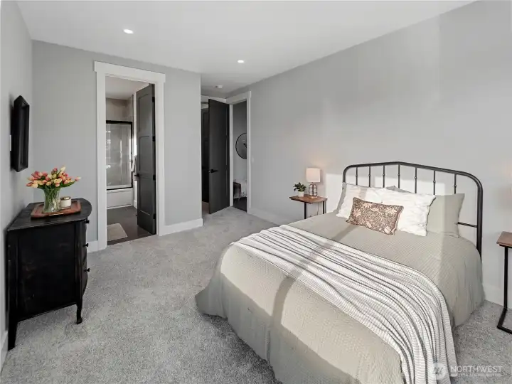 Downstairs bedroom includes walk-in closet & full bathroom.