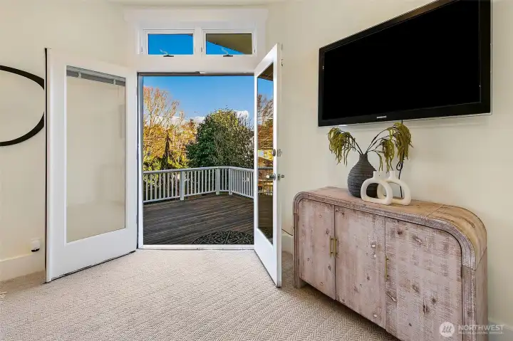 French doors open up to the large deck