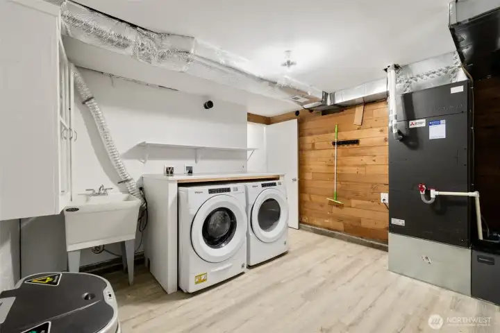 Large laundry room on the lower level. Also a new Heat Pump and on demand water heater.