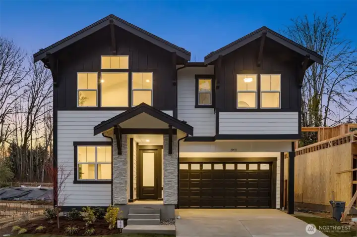 Photos of completed model on homesite #11 with identical floorplan.