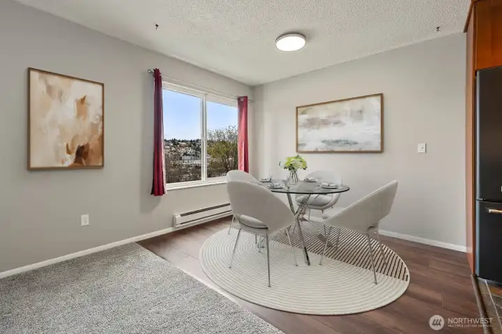 Dining off kitchen digitally staged