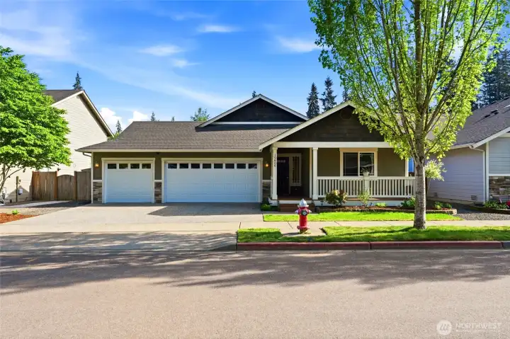 Well-maintained one-level home with great curb appeal, a welcoming front porch, and a spacious 3-car garage, all set in a quiet, established neighborhood.