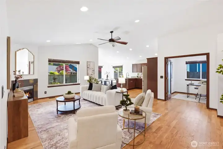 Open layout that flows seamlessly to a versatile den or office.