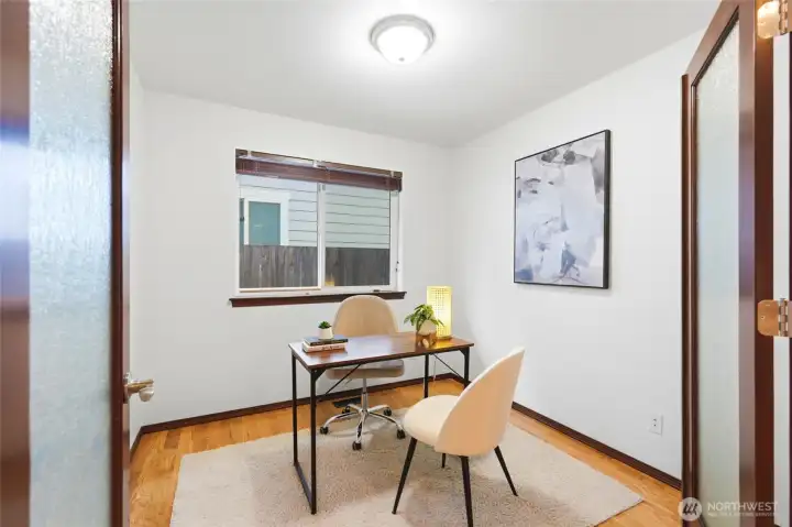 Flexible den or office with a closet, offering an easy option for a 4th bedroom.
