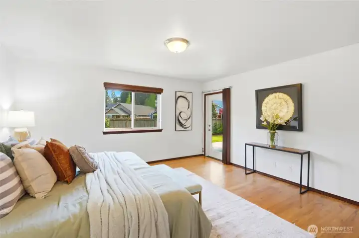 Direct access to the covered deck, bringing in natural light and easy outdoor connection.