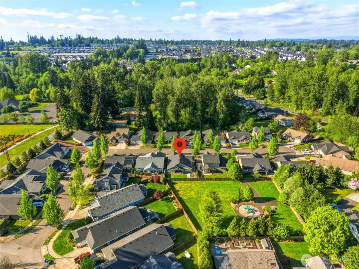 Backs to a spacious neighborhood park, adding a rare sense of openness and privacy.