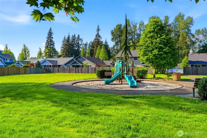 Park features play structures and open areas just steps from your backyard.