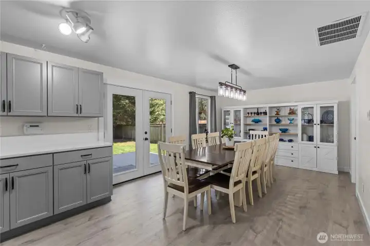 This space is super flexible - use for Family Room or Dining Room!