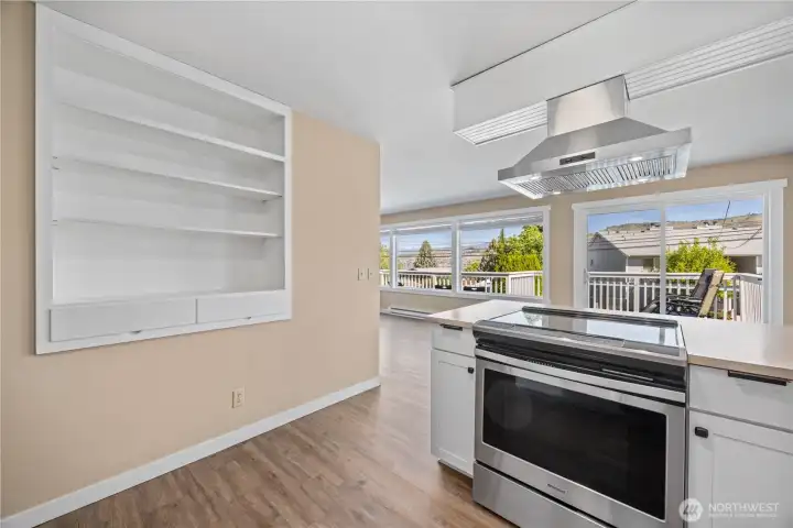 View of 3 of main level kitchen with stainless steel appliances and built in storage. View of 3 of main level kitchen with stainless steel appliances and built in storage.