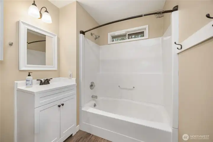 View 2 of main level full bathroom. View 2 of main level full bathroom.