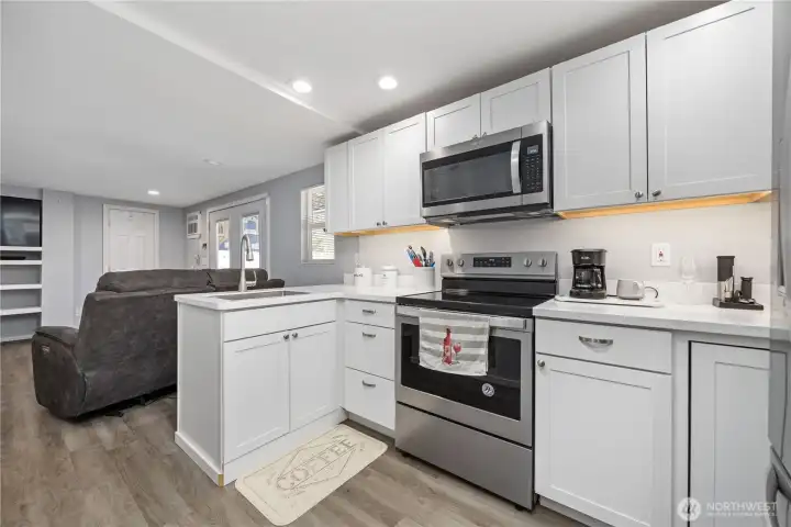 View of lower level full kitchen. View of lower level full kitchen.