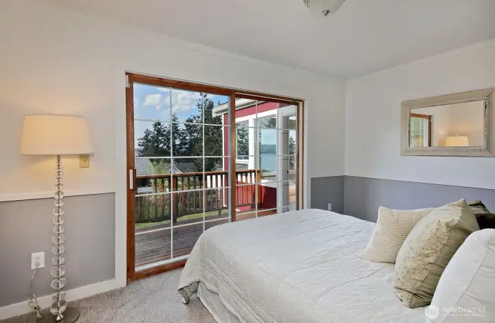 Main floor 2nd bedroom. Access to the deck.