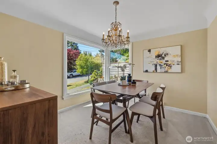 Dining room looks out over the front yard.