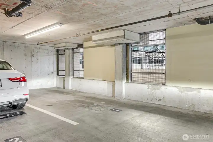Secure garage with parking space #1.