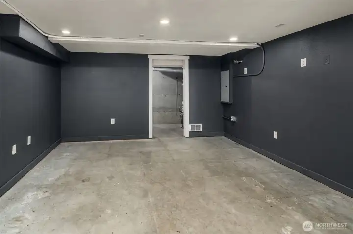 Garage space with storage that was converted into an Office. Could easily be converted back into a garage Garage space with storage that was converted into an Office. Could easily be converted back into a garage