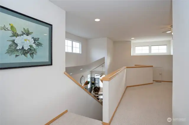 Stairs lead to a large open bonus loft