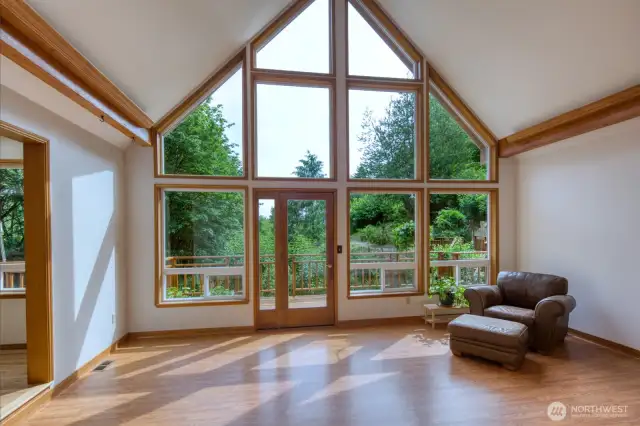 Cathedral ceilings inside, hardwood floors and open floor plan.