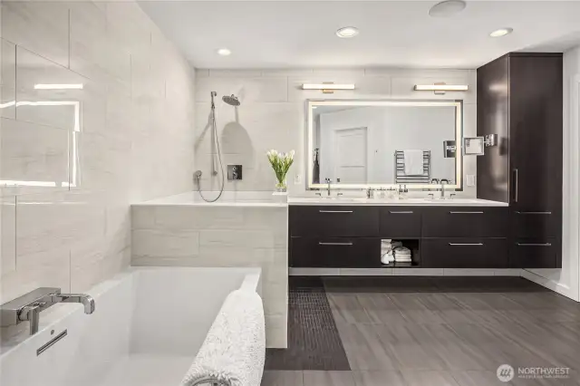 Gorgeous custom cabinetry and glimmering counters