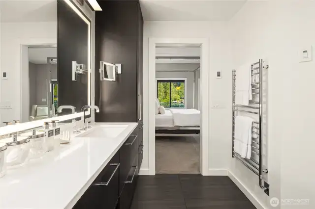 Lighted mirror and heated towel rack