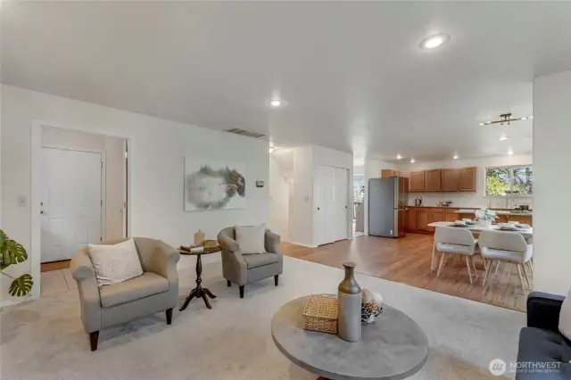 Big space for the family room! Utility room is right there with the door to the garage and a built in pantry in the gorgeous kitchen!