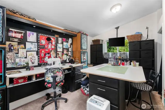 This bedroom is just a few steps down from the main floor and has separate outside entrance.