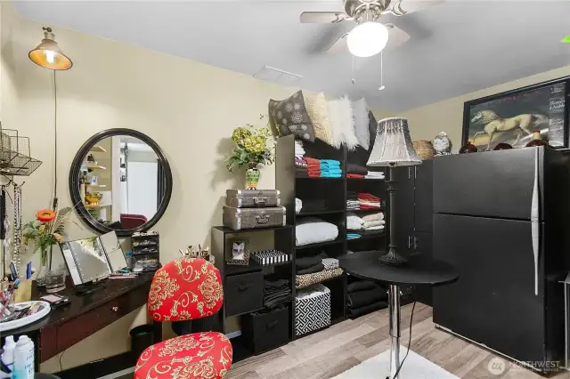 This is the extra finished room off of one of the primary suites large enough for office, den or extra closet space.