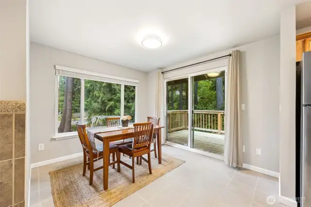 Dining area with access to back deck.