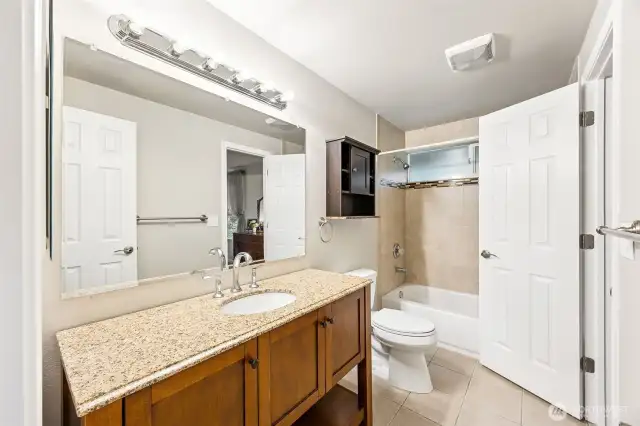 Jack-and-jill full bathroom off primary bedroom.