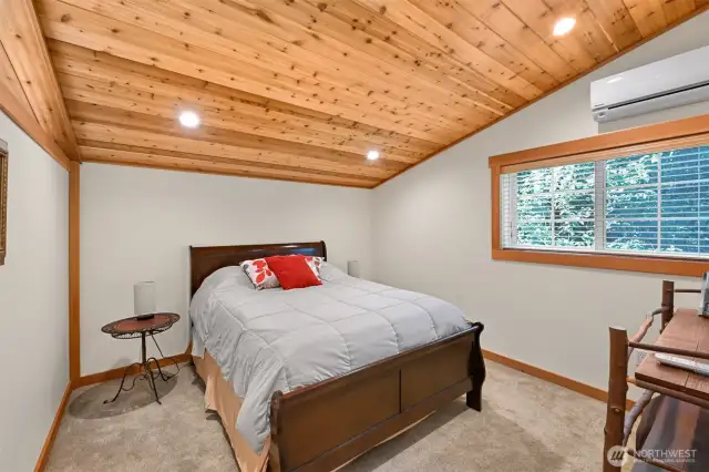 The loft bedroom with a mini split for heat and a/c.