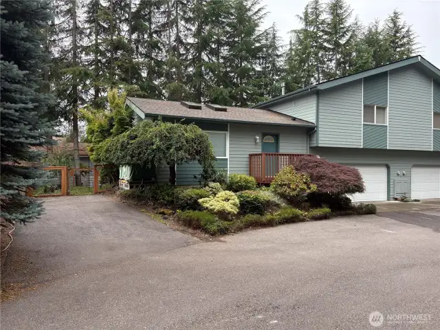 An additional parking space sits just outside the fully fenced backyard—perfect for guests or extra vehicles, with easy access to the private outdoor area.