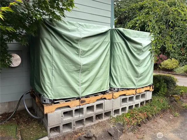 Two large overflow tanks complement the reclaimed water system—designed to handle the generous rainfall of the Northwest and keep your garden thriving year-round.