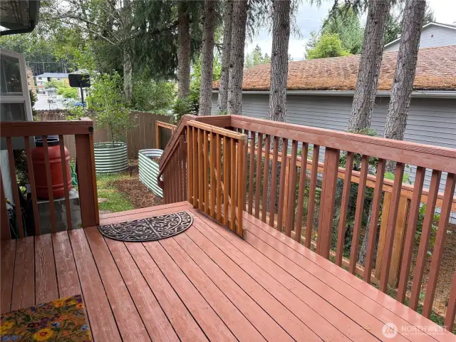 The upper deck is fully fenced—ideal for small pets or a secure outdoor spot to relax, play, or enjoy your morning coffee with peace of mind.