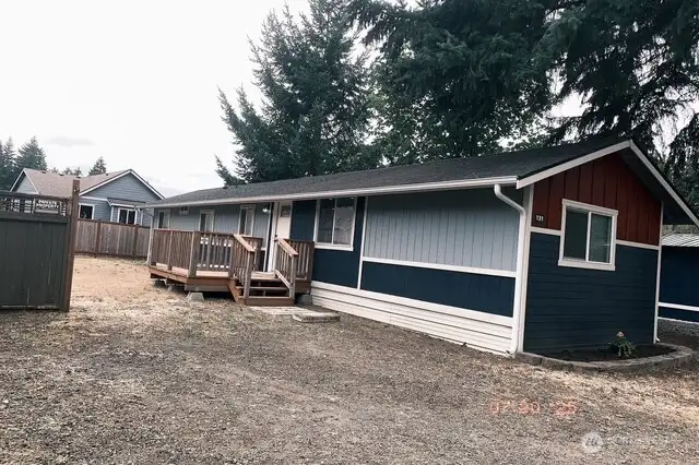New roof, good size deck, partially fenced yard, parking for 2 cars and more!