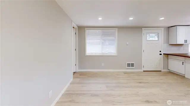 Additional view of the great room.  White trim and doors throughout the home.