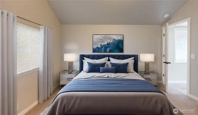 Virtually staged primary suite.