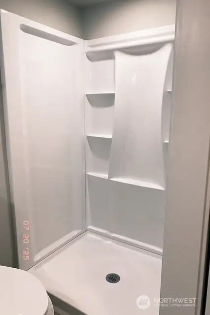 Additional view of the primary bathroom.