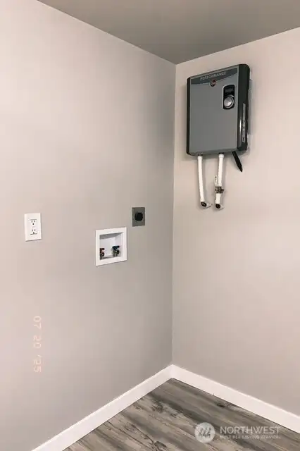View of the utility area located in the main bathroom.