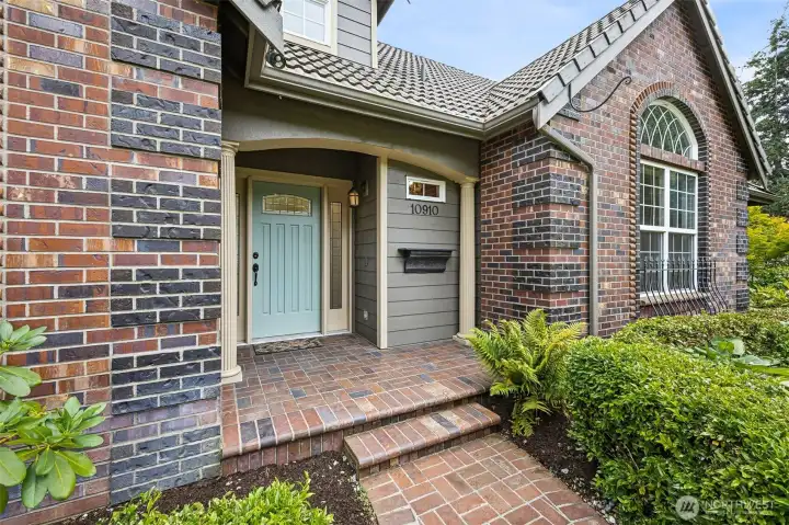 Tile roof and Professionally landscaped yard