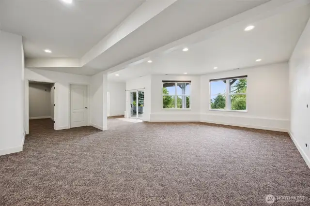 The daylight basement has access to the patio that is wired for a Hot Tub
