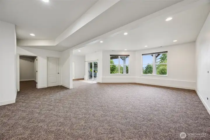 The daylight basement has access to the patio that is wired for a Hot Tub