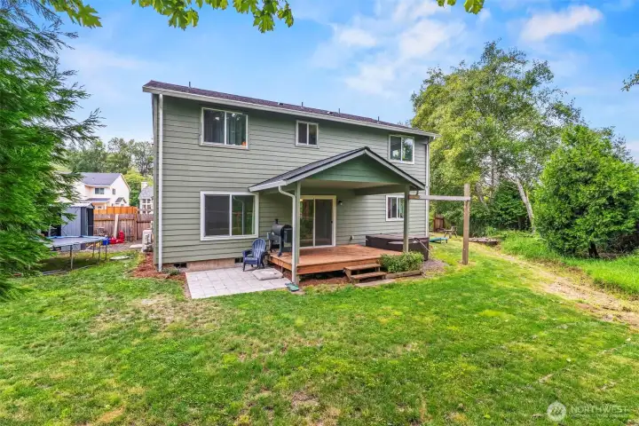 Rear and side yards offer plenty of room for everyone in the household!