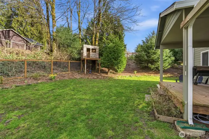 Covered cedar deck for grilling out of the weather, large fenced back yard plus pavered patio...