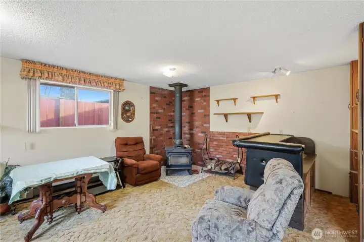 Here you can see the free standing fire place and the wet bar