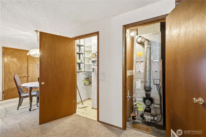 Large walk-in pantry and the  mechanical  room for the furnace