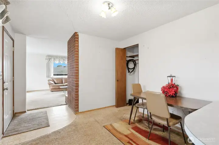 Additional  eating area off the kitchen. Guest coat closet or to store the vacuum