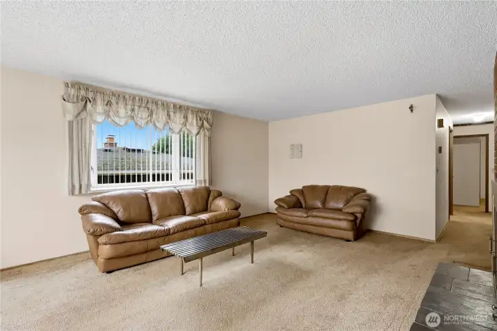 The living room is quite large - another great area for entertaining!