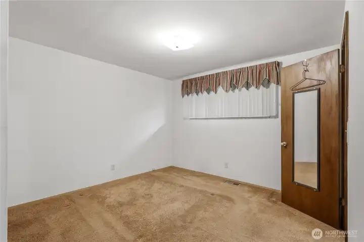 Main Bedroom has half bath off to the right side.