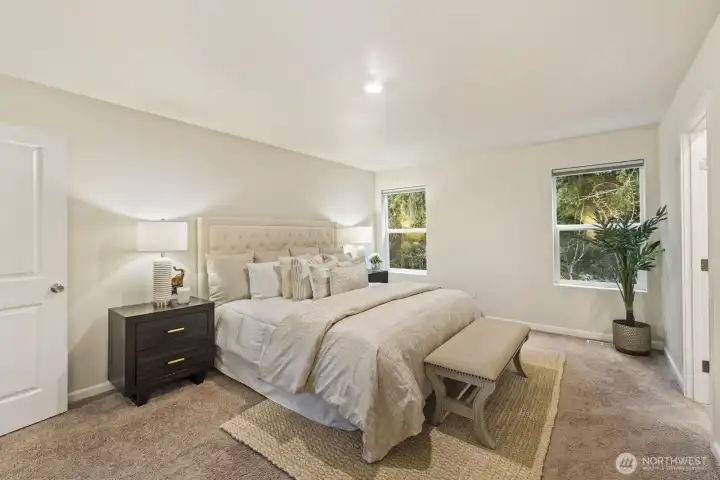 Another view of the primary bedroom