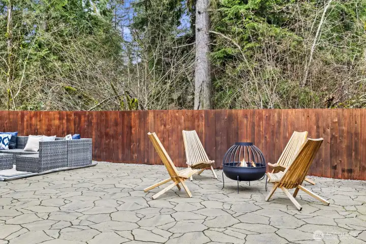 Lots of options and backing the treed land behind the fully fenced yard